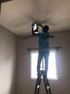 installing panasonic dark grey ceiling fan at 2nd bedroom.jpeg
