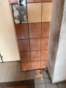 broken tile at lift
