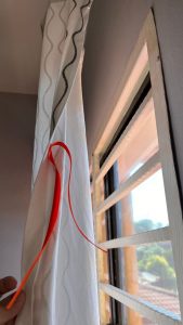 curtain use ribbon to avoid people can peek inside
