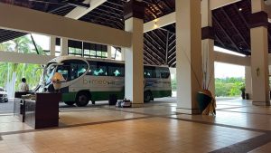 bus departing to manatanani island from magellan hotel lobby